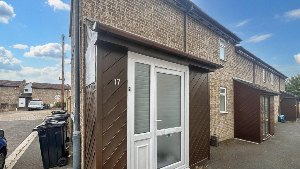 Street-facing entrance to a terraced property w...