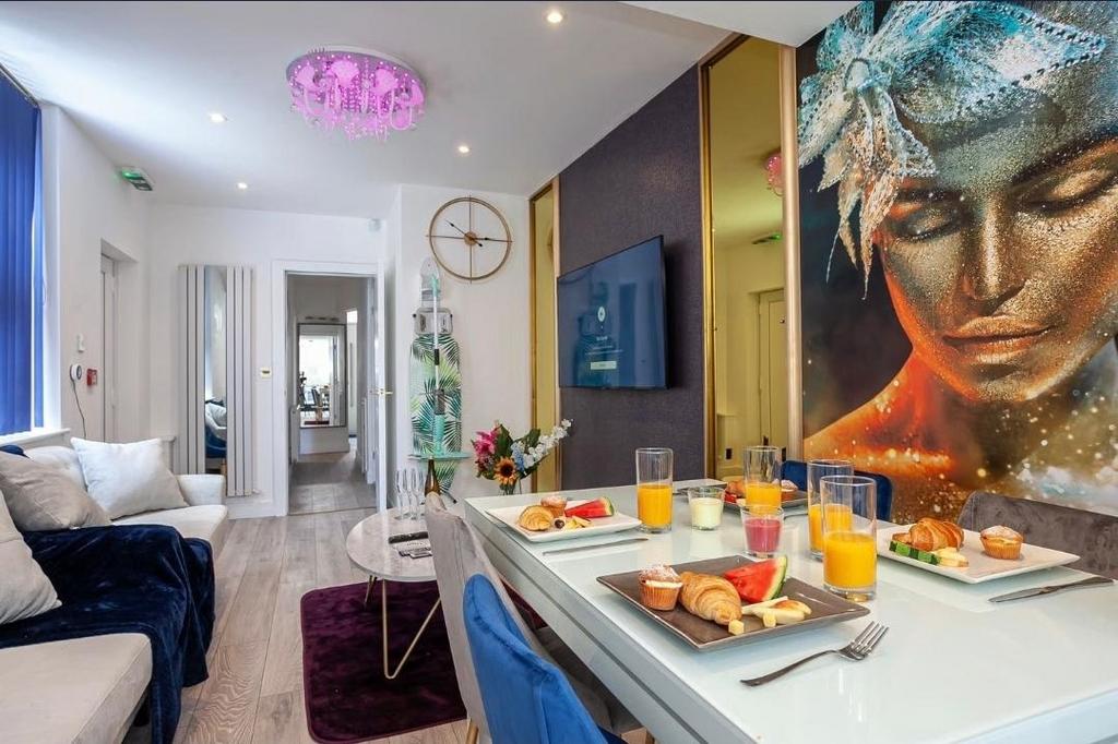 Stylish open-plan living and dining area with c...