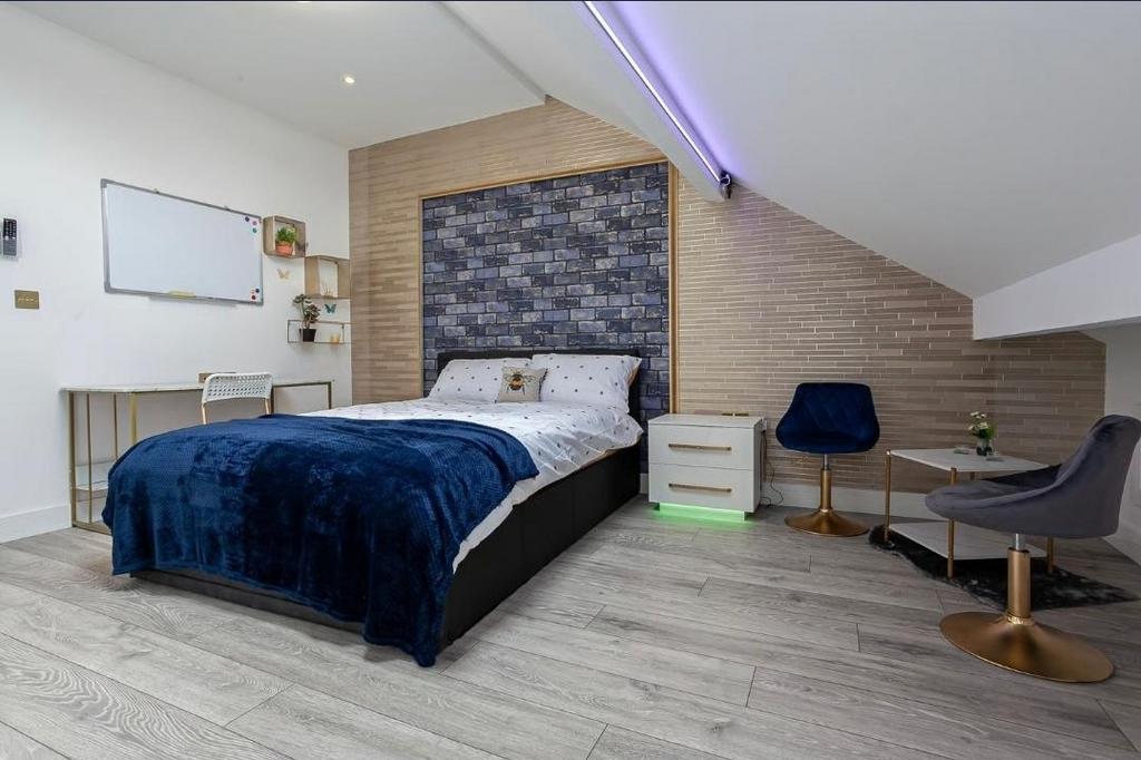 Contemporary bedroom with a comfortable double ...