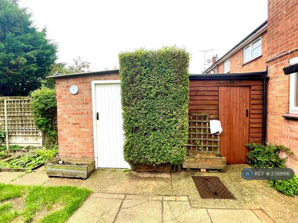 Two Sheds In Garden