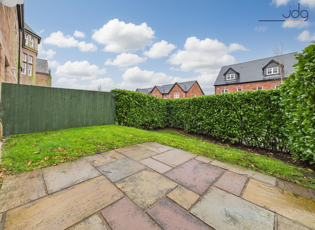 Spacious garden with a mixture of lawn and...