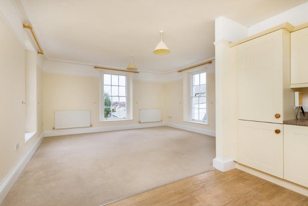 Kitchen looking to living area