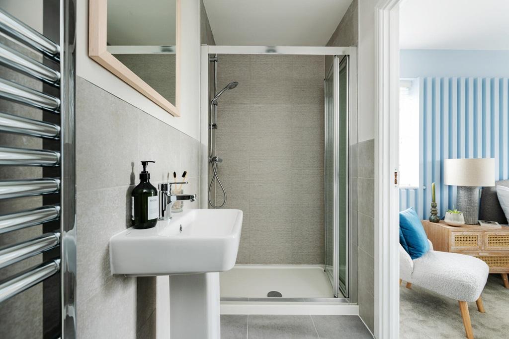 The main bedroom boasts an en-suite shower room