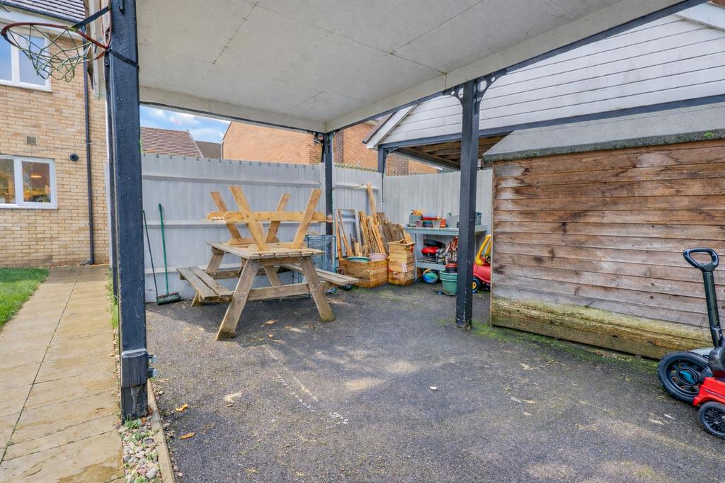 Carport, Now a Covered Seating Area