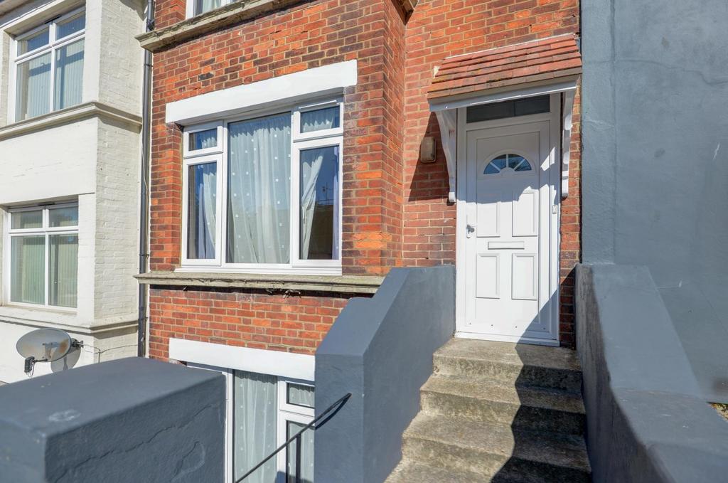 A welcoming entrance to a traditional brick hou...