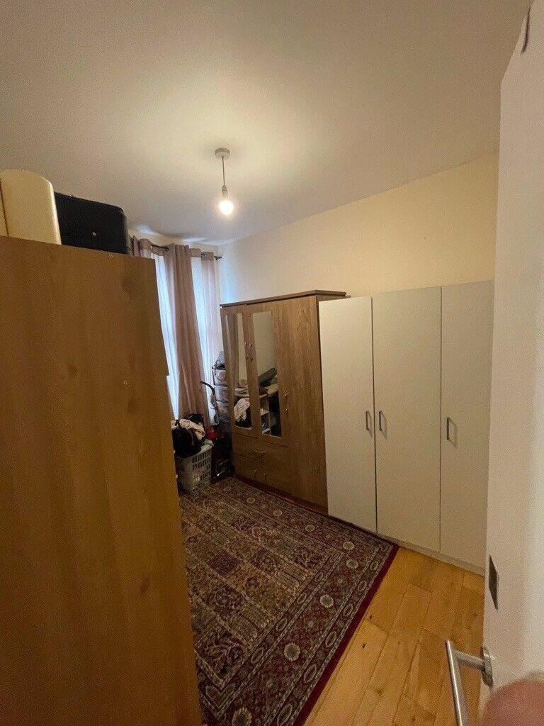 Bright bedroom with ample wardrobe storage, ful...
