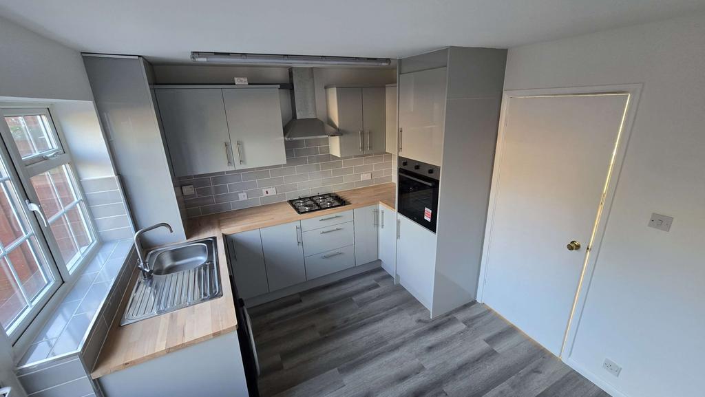 Modern Kitchen Leading To Garden