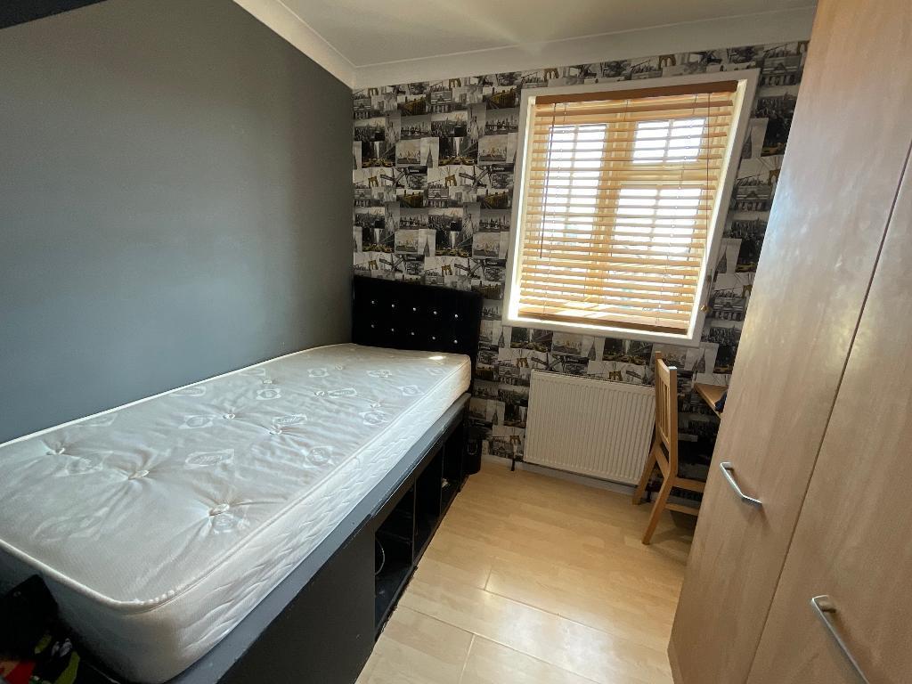 BEDROOM THREE 9' x 8'5