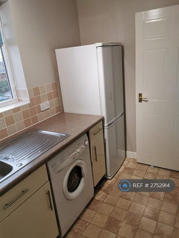 Kitchen Showing Fridge Freezer