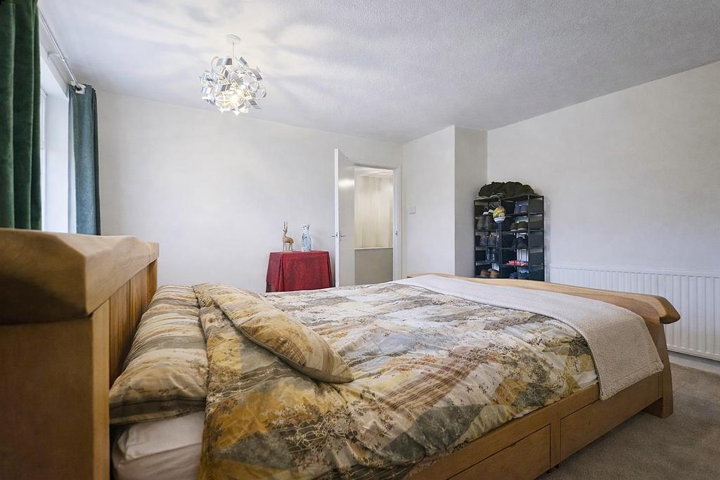 Cosy bedroom with light and shadows.png