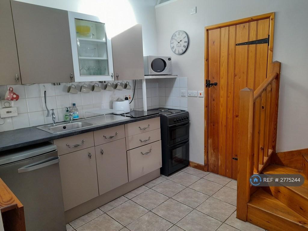 Kitchen With Door To Shower Room