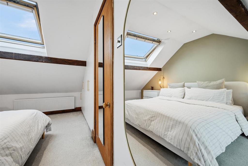 Bedroom Three - through mirror.jpg