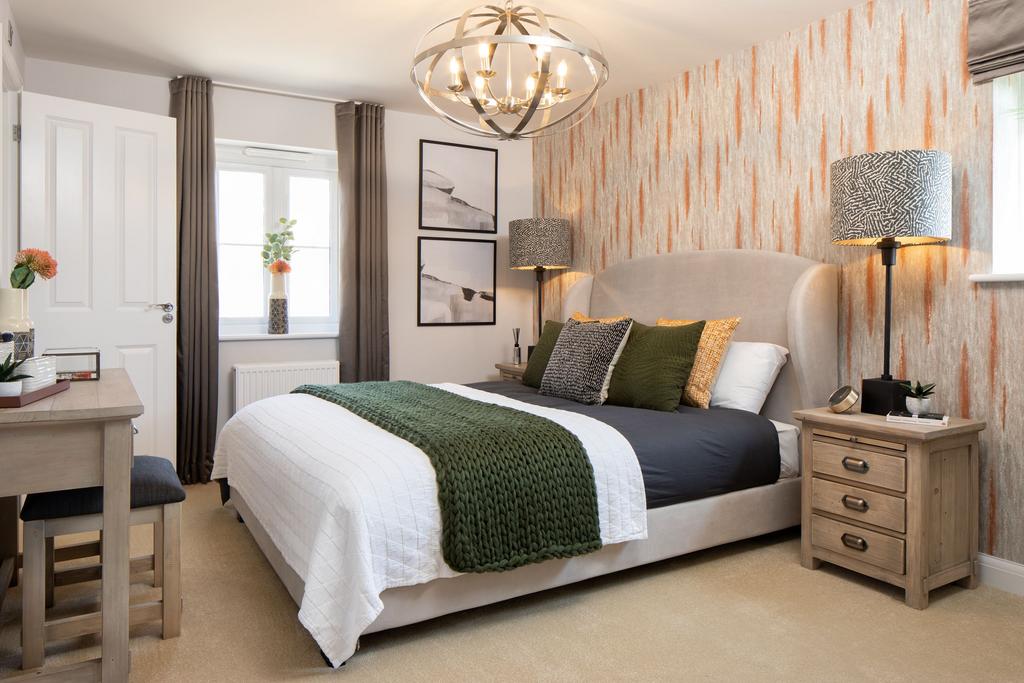 En suite main bedroom in the Alderney 4 bedroom...