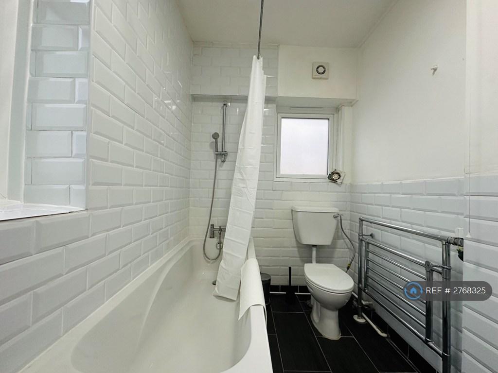 Clean, Modern Bathroom With Full-Size Bath