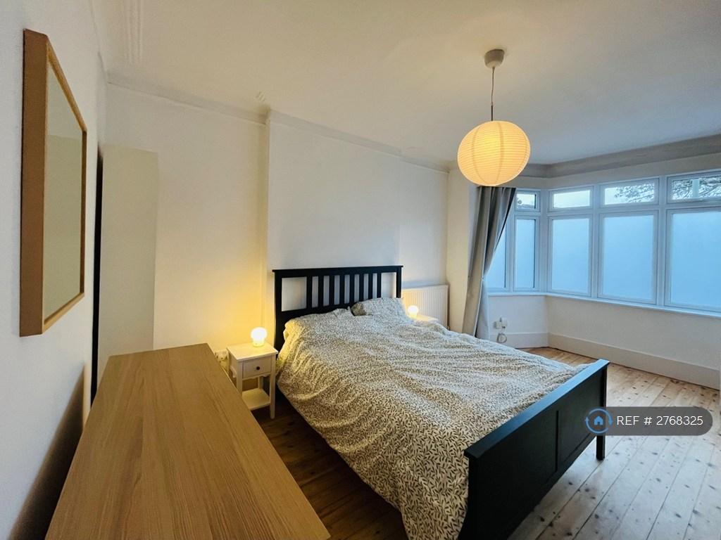 Large South-Facing Bedroom With Bow Window