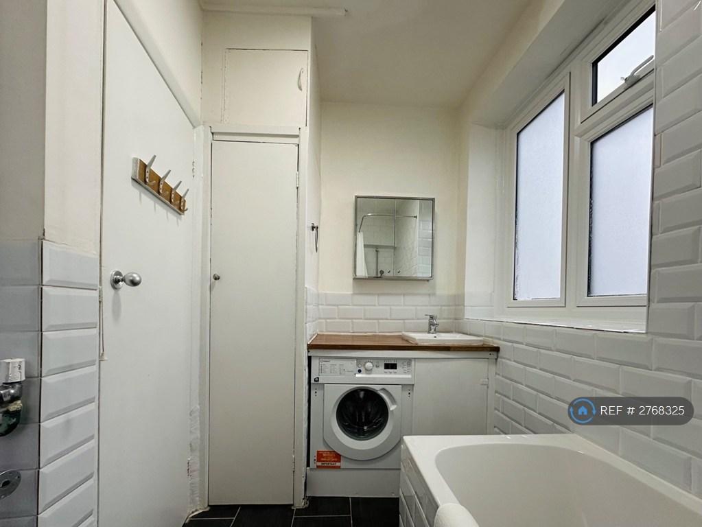 Clean, Modern Bathroom With Full-Size Bath