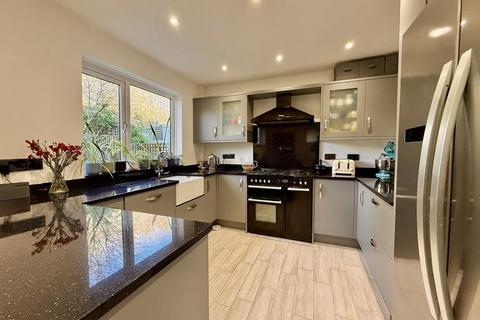 3 bedroom end of terrace house for sale, Taunton Avenue, Whitleigh, Plymouth. A much-loved 3 bed family home with a private garden and open southerly views