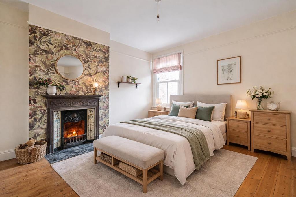 Cozy Victorian bedroom with tropical accents.png