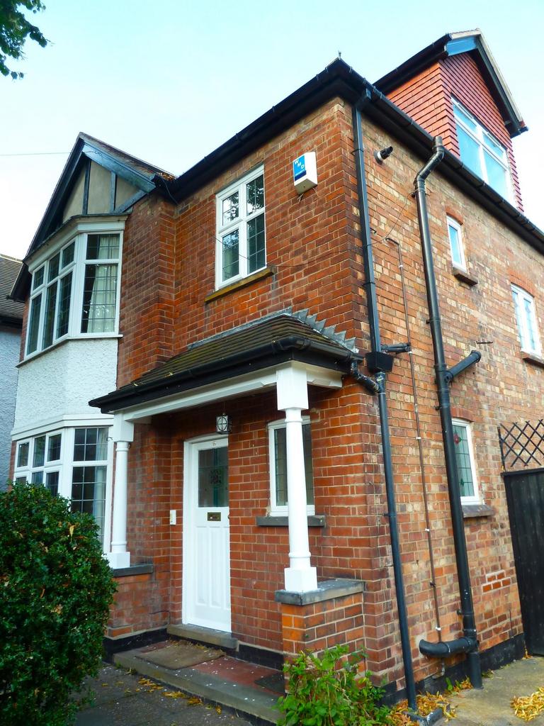 Attractive red-brick semi-detached house with a...
