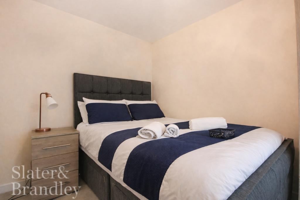 Modern bedroom with navy accents