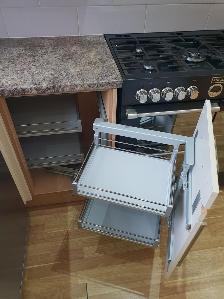 Modern kitchen corner with a gas range and a pu...