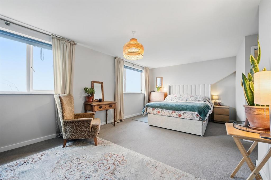 Bedroom Three to windows.jpg
