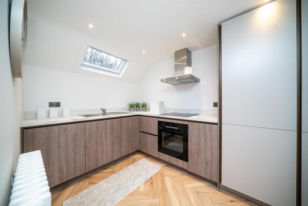 Kitchenette To Bedroom Two