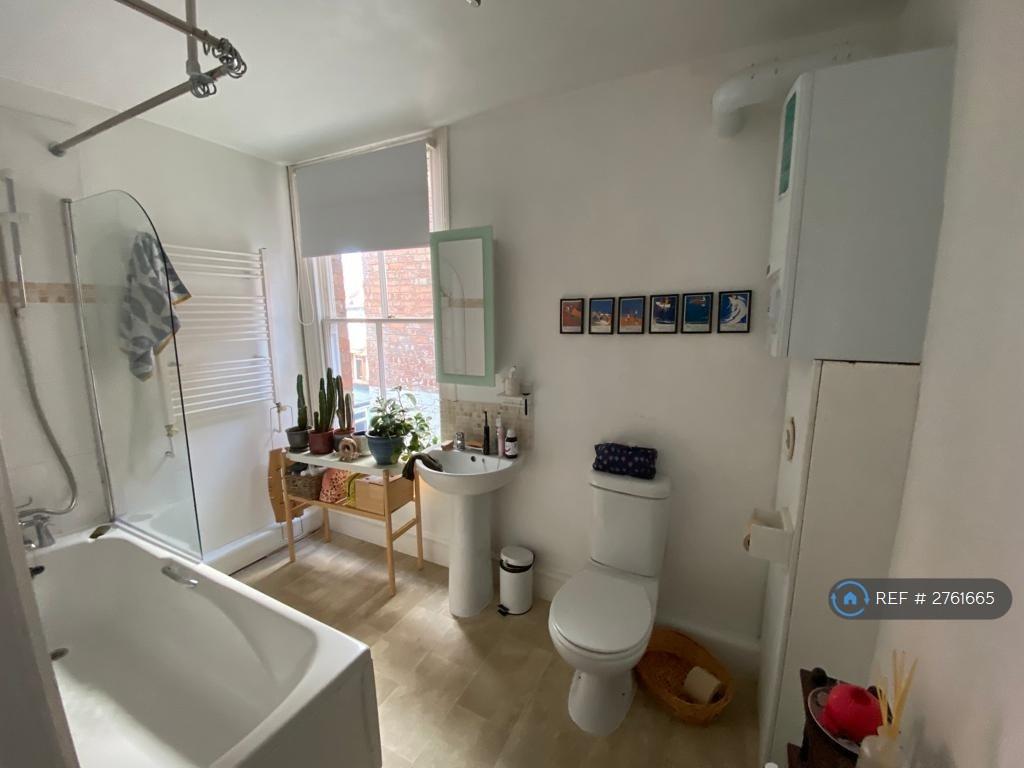 Family Bathroom With Shower Over