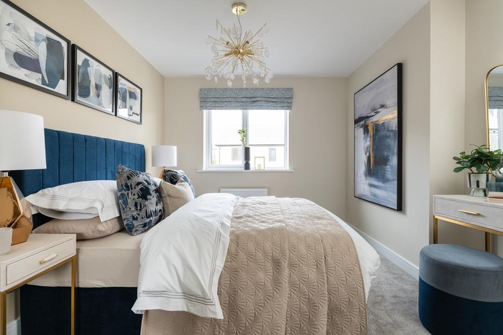 Bedroom 2 overlooks the front of the home