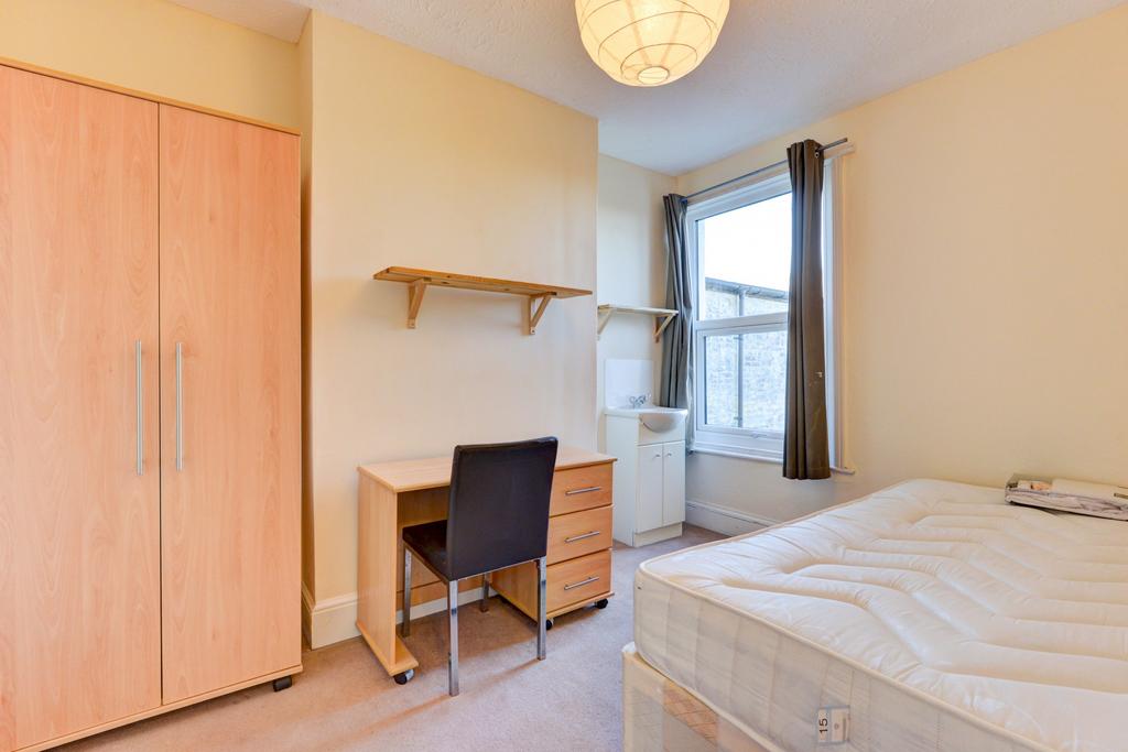 Bright, neatly presented bedroom with a double ...