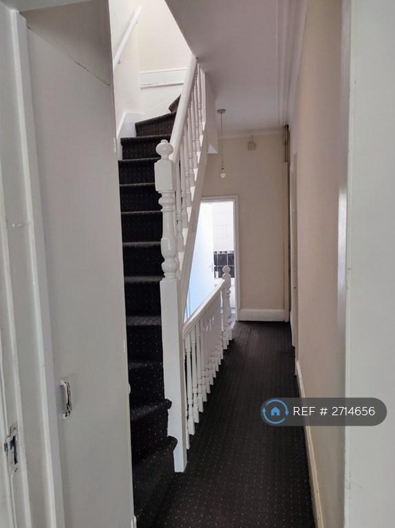 The Staircase Leading To Third Floor And Hallway