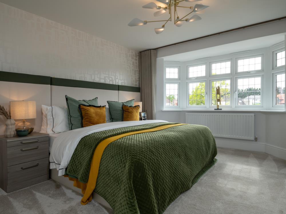 Main bedroom of the Leamington Lifestyle, a 3...