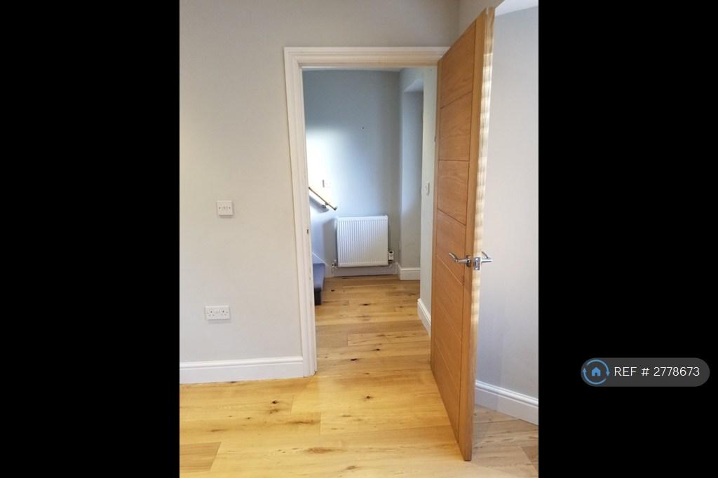 Living Area Has Door To Hallway