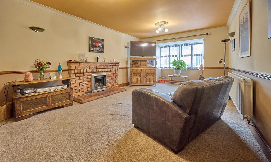 Open plan living/dining/kitchen to rear