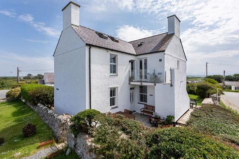 undefined, Rhoscolyn LL65