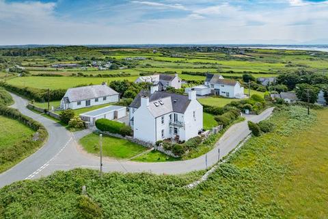 undefined, Rhoscolyn LL65
