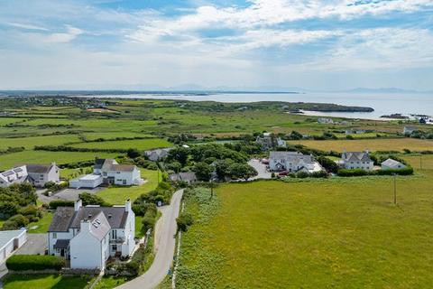 undefined, Rhoscolyn LL65