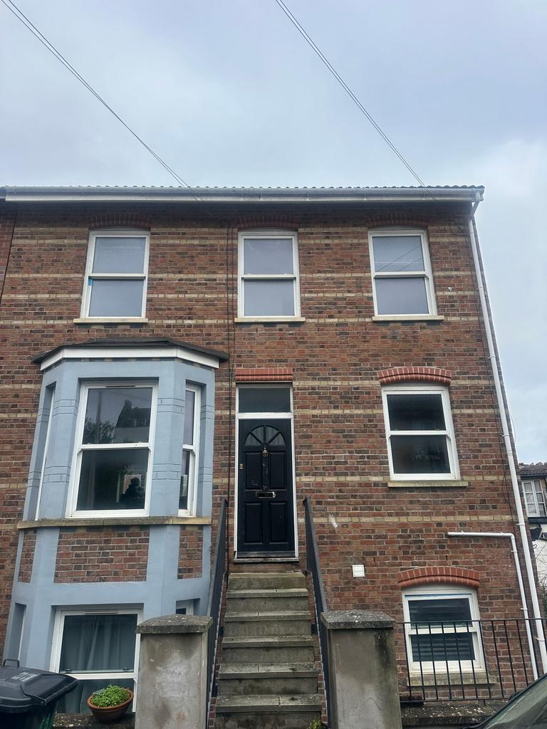 Well-maintained brick-front terraced house with...