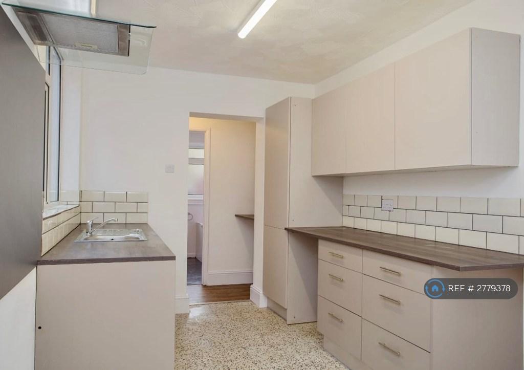 Kitchen With Dining Area