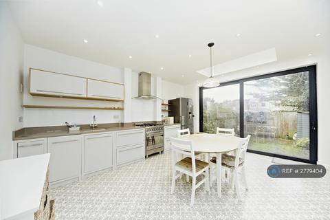 4 bedroom terraced house to rent, Durnsford Avenue, London, SW19