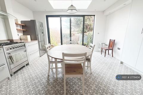4 bedroom terraced house to rent, Durnsford Avenue, London, SW19
