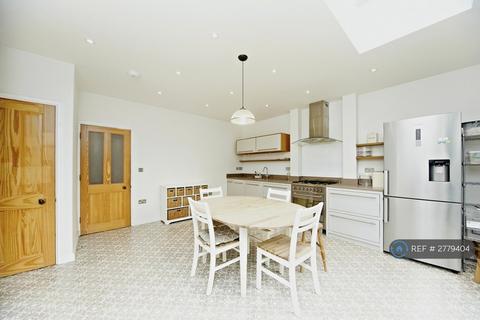 4 bedroom terraced house to rent, Durnsford Avenue, London, SW19