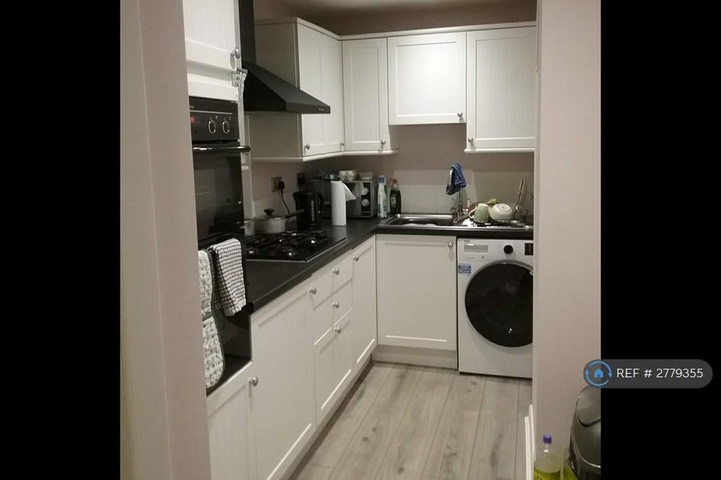 Kitchen With Washer Drier