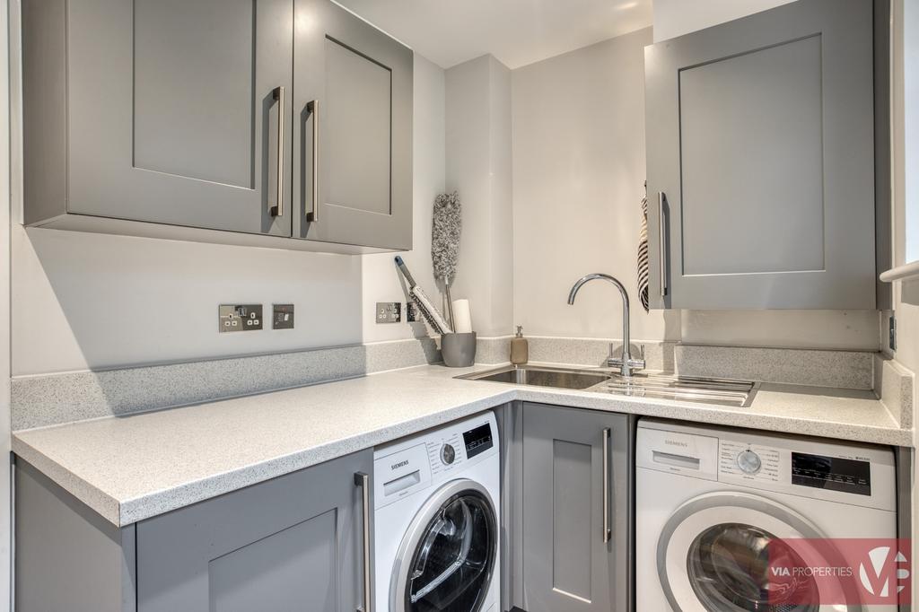 Utility room accessed from kitchen