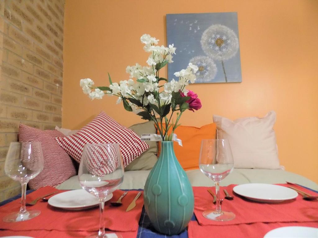 Bright, cosy dining setup in a stylish living a...