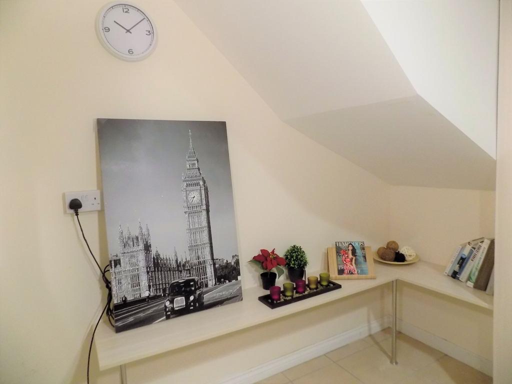 Well-presented corner seating/display area with...