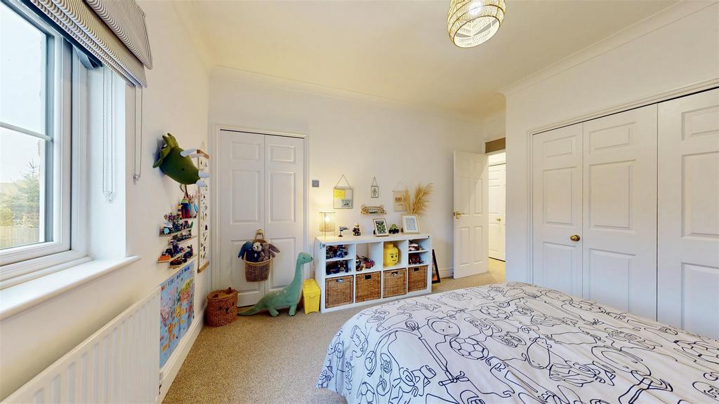 Bedroom two showing storage