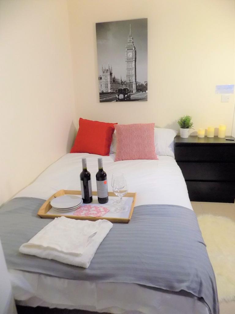 Bright, neatly presented bedroom with a comfort...
