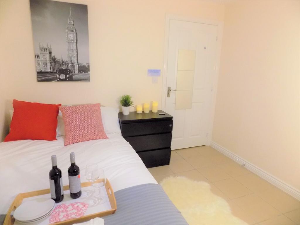 Bright, neatly styled bedroom with a double bed...