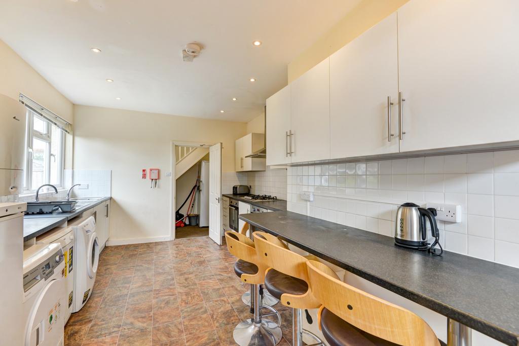 Bright and well-maintained kitchen featuring mo...